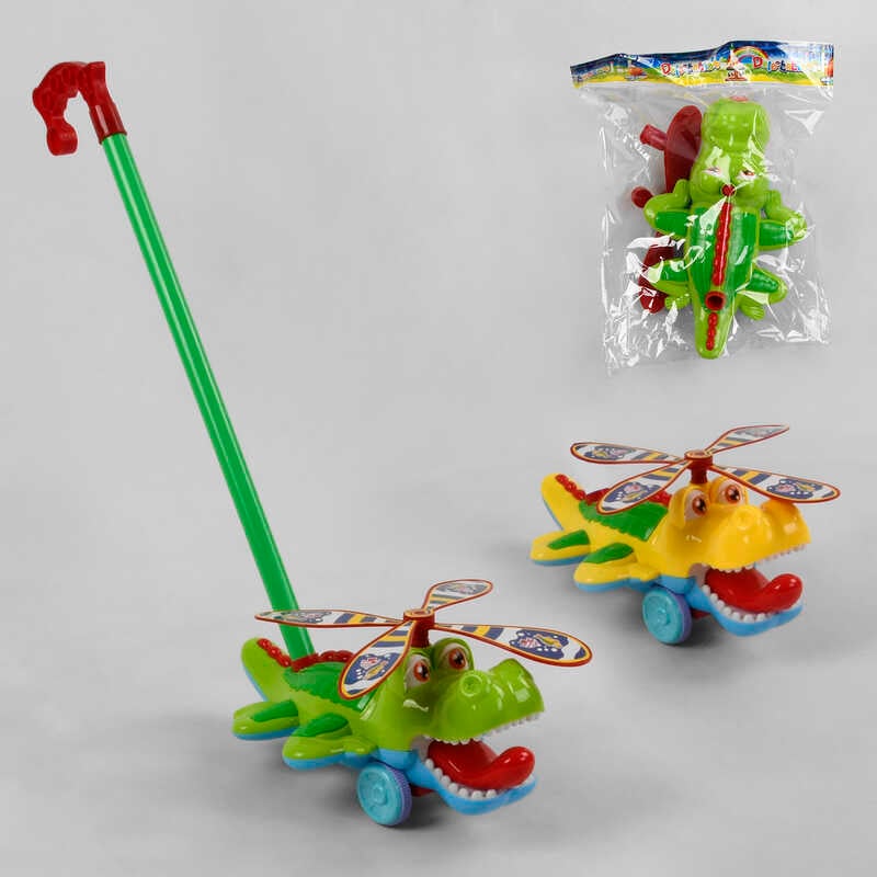 Каталка 367 (60/2) "Крокодил", 2 кольори, дзвіночок, з ручкою, в пакеті