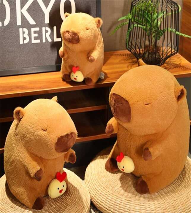 М`яка іграшка M 18197 (25) 45 см, заводний механізм, змійка на спині